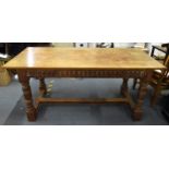 A 20th century limed oak farm table, possibly by Heals, 74.5 cm high x 168 cm long x 75 cm wide