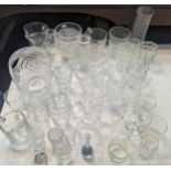 A collection of domestic glassware A/ to include wine glasses, vases, cut crystal and others