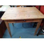 A stripped pine side table with single drawer on tapered legs 73H x 84W 58D Location AIF