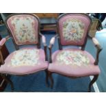 A pair of 20th Century French style beech framed tapestry upholstered armchairs. Location:RAB