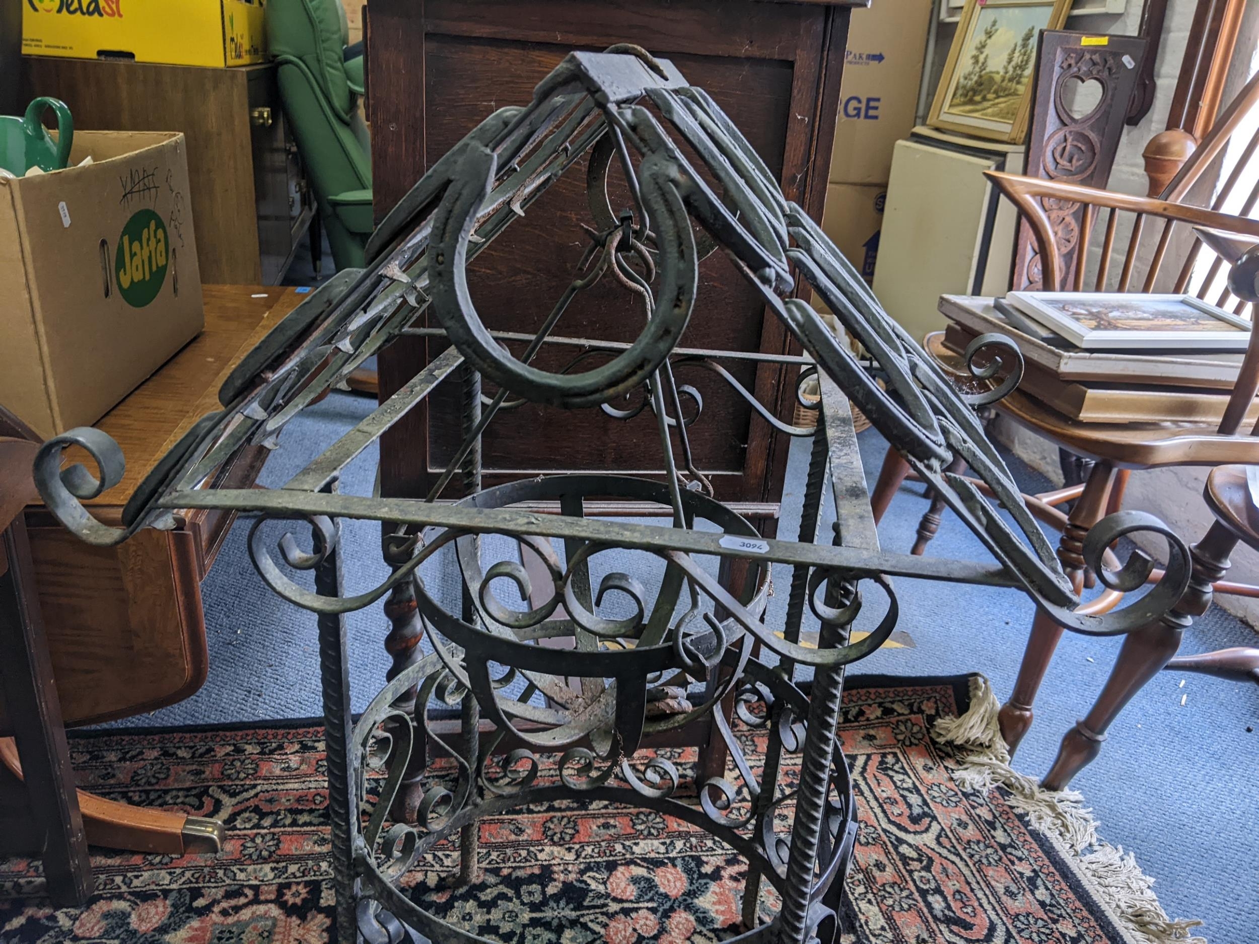 A wrought iron garden centrepiece with central hanging basket, the top made from horseshoes 84cm h x - Image 2 of 2