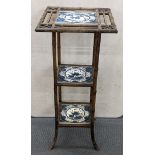 A Victorian bamboo three tier jardinière stand inset with three Minton tiles, 83h x 37.5w together