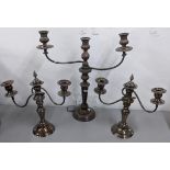 A Victorian Sheffield plate three-branch candelabra, together with a pair of matching candelabras
