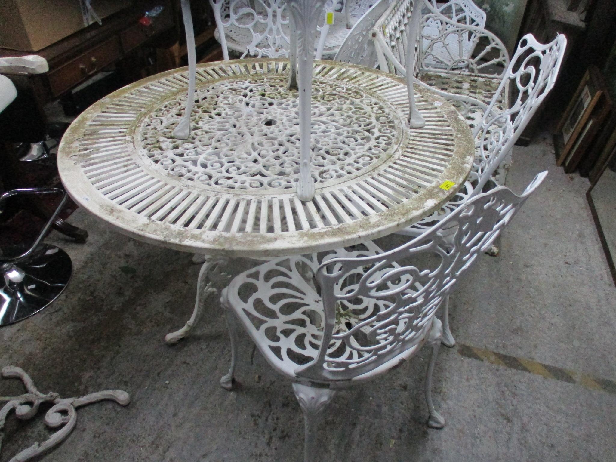 A larger white painted aluminium garden table, circular top with space for parasol column, legs - Image 3 of 3