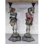 A pair of 19th century painted spelter figures of soldiers holding braziers, Location: