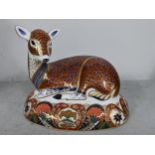 A Royal Crown Derby Collector's Guild paperweight of a deer 13cmh x 16.5cm w Location:6.1