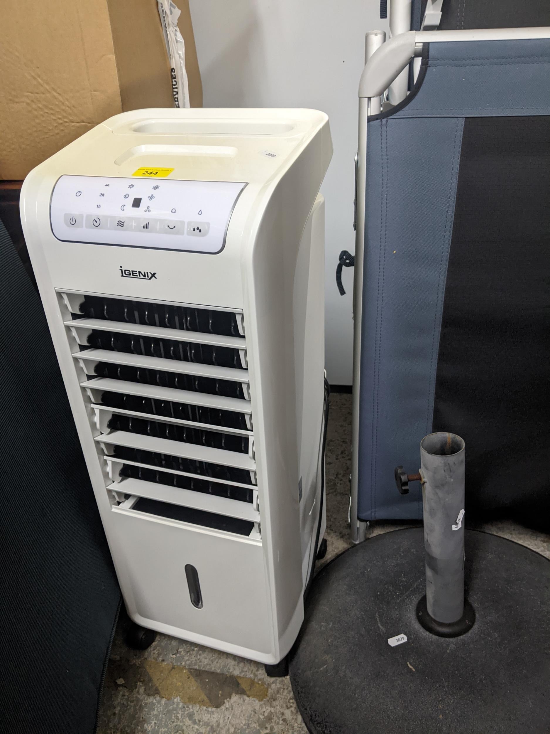 A generic portable evaporative air cooler, 220 -240, model 1G9703 Location: