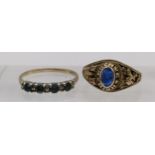 A 9ct gold ring set with stones 1.8g, and a 10ct gold American style ring 3.8g Location:CAB3