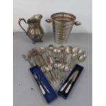 Silver plated items to include twin handled Champagne chiller bucket, a silver plated jug, along