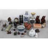 A mixed lot to include a Chinese cloisonne vase, famille rose baluster vase, mantel clock and