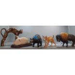 Coalport - a group of three models of wild animals to include buffalo, wildcat and brown bear and