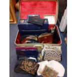 A quantity of vintage bags, purses and cases to include a Guess purse, an Indian black velvet and