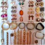 Vintage costume jewellery, mainly late 20th Century earrings and gold tone bracelets to include a