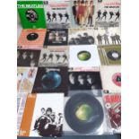 A large quantity of mainly 1960's-1980's single 45rpm records to include The Beatles, Rolling