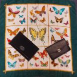 A 1980's Pierre Cardin silk butterfly scarf together with a 1980's Louis Feraud black fabric