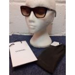 Chanel-A pair of dark tortoiseshell effect sunglasses, model no: 5266 C714/85 with branded cloth