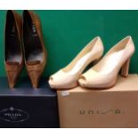 Prada- A pair of ladies brown court shoes with pointed toes and kitten heels, never worn, size