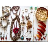 Vintage jewellery to include coral necklaces, bead necklaces from Bali, a pearlised multi-strand