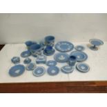 Wedgwood blue Jasperware to include plates, candlesticks, a cake stand and other items Location: