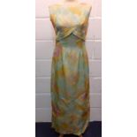 A 1950's Edda Jeni Model Summer sleeveless, full length dress in lime green, yellow, cream and