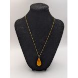 A yellow metal and amber necklace, total weight 6.1g Location:CAB