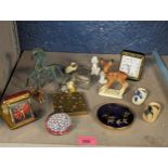 A mixed lot to include a millefiori paperweight, travel clocks, ceramic models to include cats,