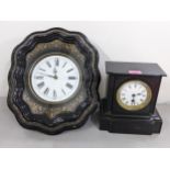 A Victorian black slate 8-day mantel clock, together with a 19th century French battery converted