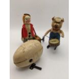 Two Schuco mechanical toys to include Schuco 786 Clown with suitcase, Schuco Pig with drum and a