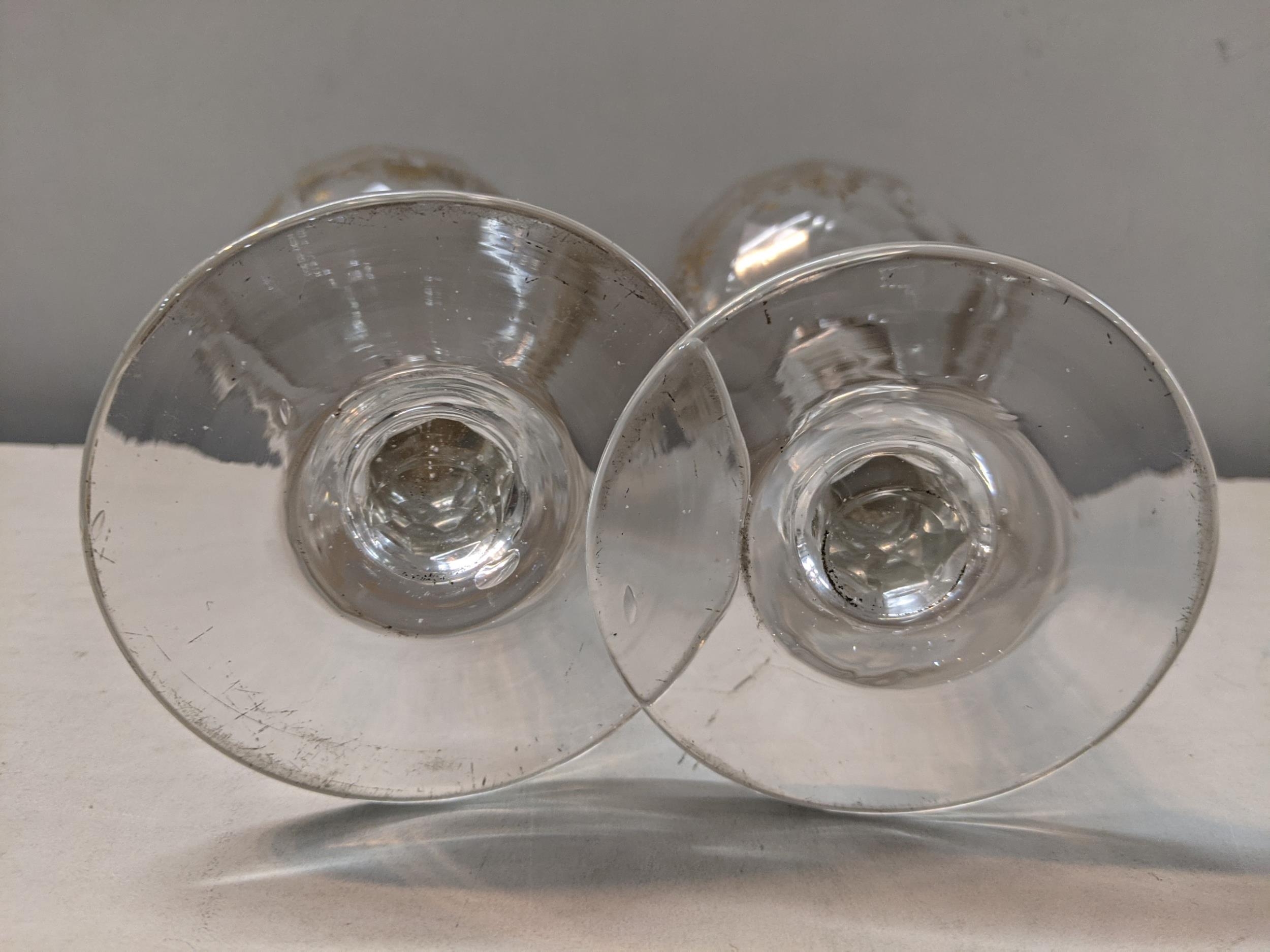 A pair of late 18th/early 19th century gilded wine glasses in the neo classical design and having - Image 2 of 2