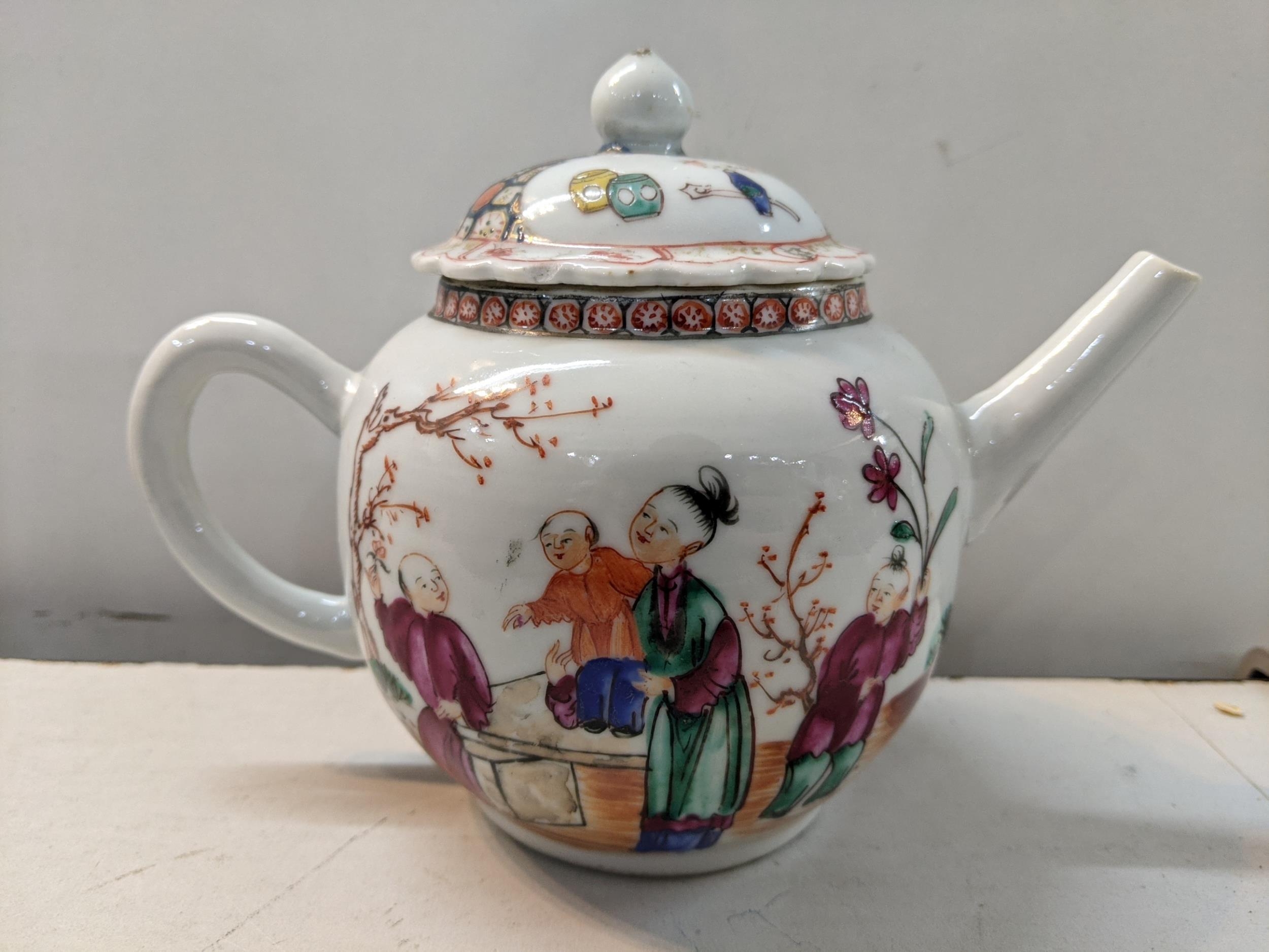 A late 18th century Chinese famille rose teapot with a later lid Location: