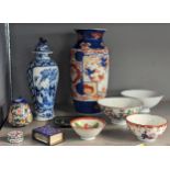 A group of Oriental items to include a blue and white china four-character Kangxi mark lidded vase