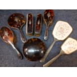 Early to mid 20th Century dressing table brushes, combs and mirrors to include a silver and