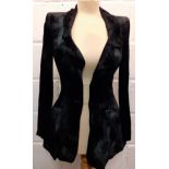 Biba- A vintage green and black velvet evening jacket with subtle starburst design and double button