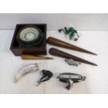 Boat related items to include a bearing block, a resin scrimshaw, fids, a reel and a Richie Boston