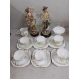 A Shelley teaset decorated with a landscape and a Capodimonte pair of composition figures Location: