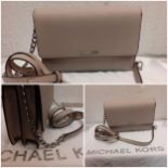 Michael Kors- A new grey leather occasional shoulder bag having silver tone hardware, a part chain/
