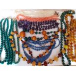 Vintage bead necklaces to include malachite, amber, amber effect, seed pearls, coral, rose quartz,