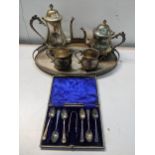 A Victorian four-piece silver plated tea service, together with a pierced tray and cased cutlery