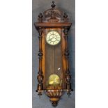 A Victorian walnut Vienna regulator wall clock having turned finials and reeded columns, 130cm h A/F