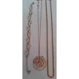 A small quantity of modern costume jewellery to include a Monet gold tone chain and a Swarovski gold
