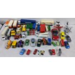 A collection of loose toy vehicles to include Tonka tipper truck, Lledo bus, Tonka aircraft 1979,