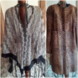 Missoni-A silver, black and gold crotchet cape having a zig zag pattern with black border together