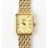 A Rotary, quartz, ladies, 9ct gold wristwatch, having a textured dial with baton markers, 9ct gold