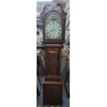 An early 19th century mahogany longcase clock, having a broken swan neck pediment and painted arch