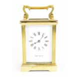 A Mappin & Webb carriage clock, with brass and bevelled glass case, enclosing an enamel face with