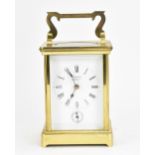 A French brass and bevelled glass cased carriage clock, 20th century, by Romanet Morbiet, the