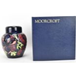 A Moorcroft pottery 'Anemone' ginger jar, limited edition 34/94, 1998, with tubelined purple/pink