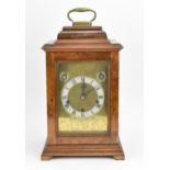 A German walnut bracket clock by Winterhalder & Hofmeier, Black Forest, with silvered chapter ring