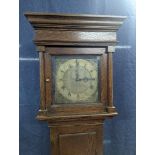 An 18th century 30 hour oak longcase clock, the case having a stepped pediment and pillars