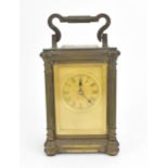 An early 20th century bronze carriage clock, marked Goldsmiths Alliance Limited, Cornhill London,